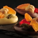 Mendiant Zartbitterschokolade mit kandierten Früchten |Philippe Rochat